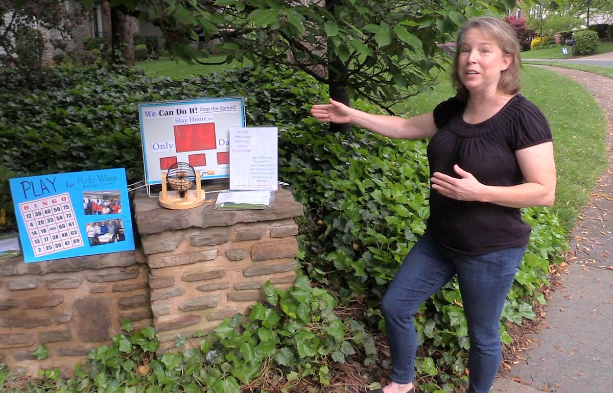Angela Parker of Huntersville talks about her new daily display around the Stay at Home Countdown Clock outside her home on Friday, April 24, 2020. Parker wanted to bring smiles to her neighbors stuck at home during the coronavirus pandemic Children and adults have always enjoyed her annual Countdown to Christmas clock that she put up each year in the Wynfield neighborhood. So why not a clock counting down the days to the end of Mecklenburg CountyÕs Stay at Home Order, she thought. Parker adds a different 2-square-foot educational display around the clock each morning.