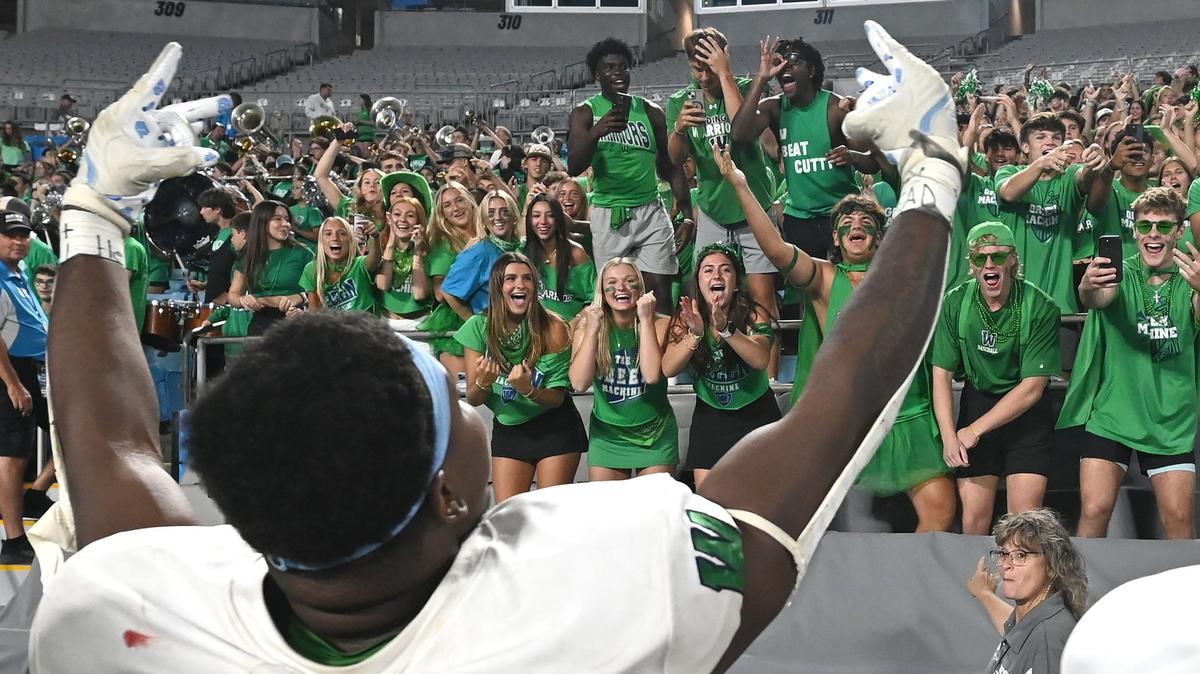 Weddington fans celebrate their team’s 13-7 victory over Providence Day with defensive lineman Aiden Harris, back to camera, on Thursday, August 22, 2024 at Bank of America Stadium in Charlotte, NC. Both teams competed in the Keep Pounding High School Classic.
