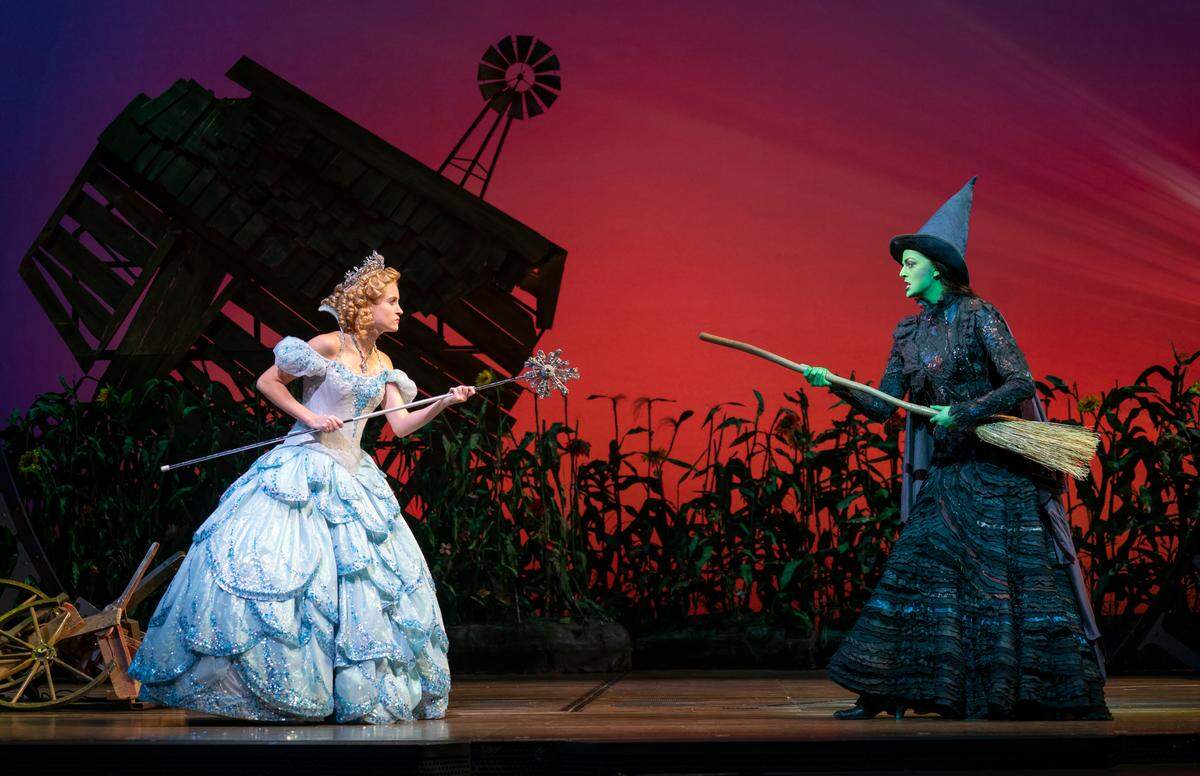Allison Bailey as Glinda, and Talia Suskauer as Elphaba in the North American tour of “Wicked,” now in Charlotte.