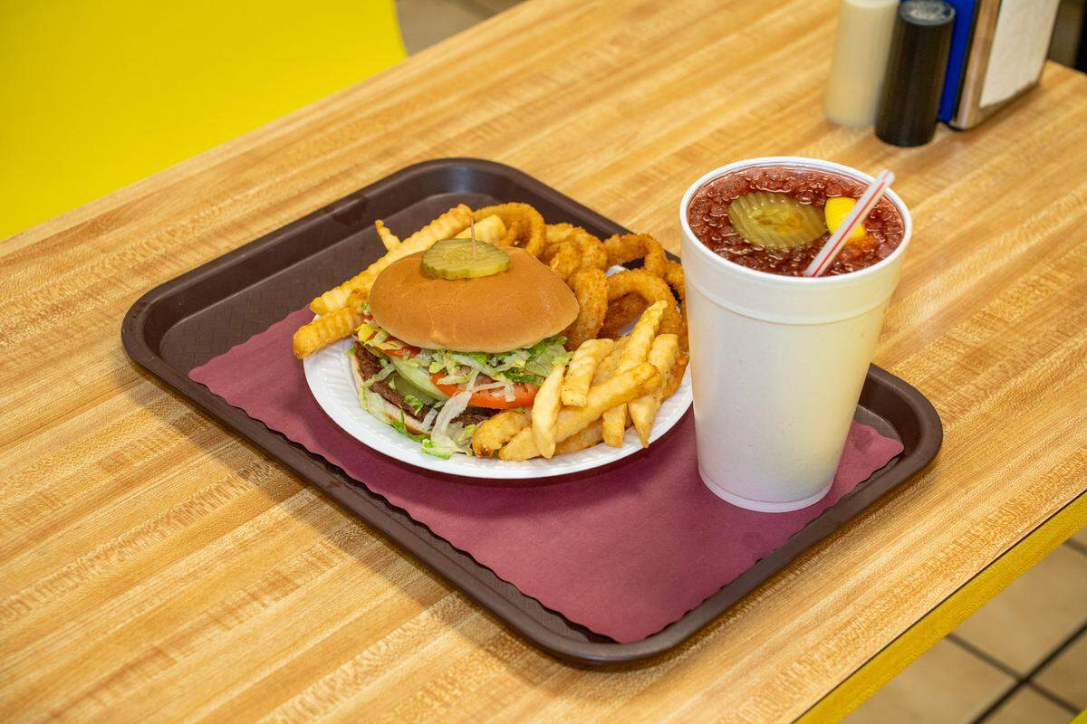 A What A Burger and a Witchdoctor with a side of onion rings and fries at What-A-Burger at 1252 Old Charlotte Rd SW, Concord, NC.