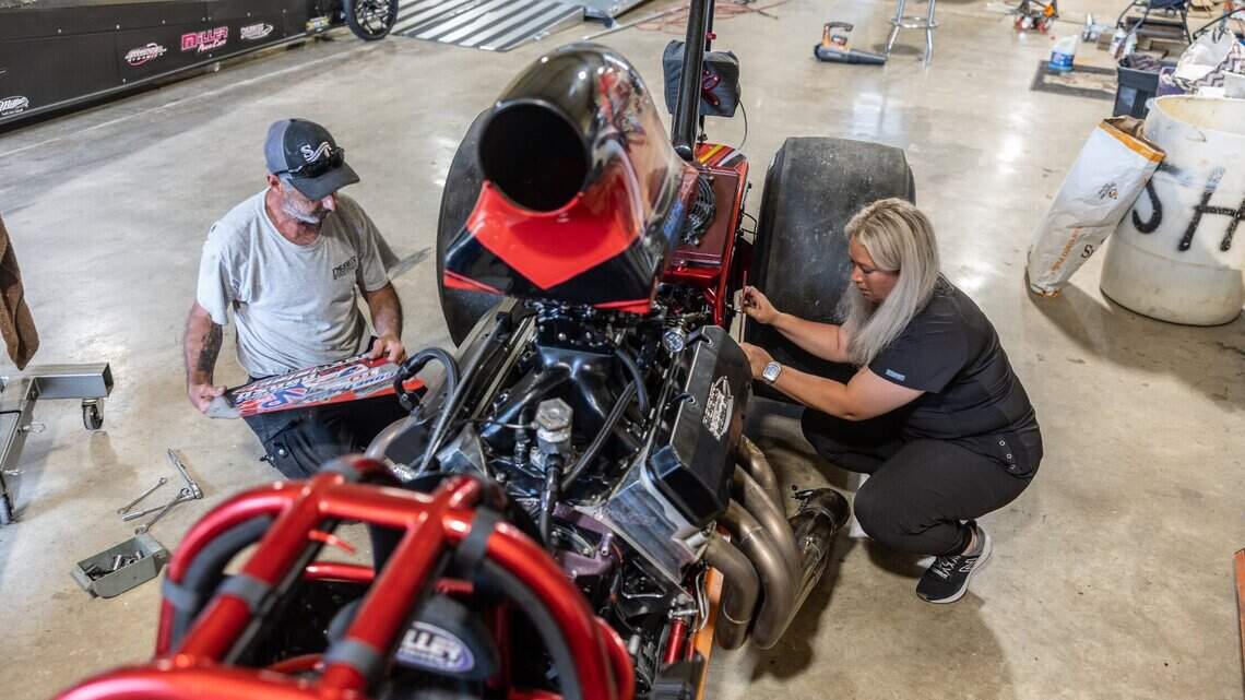 When not assisting cancer patients, she’s driving fast — with help from her dad