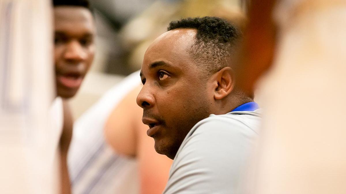 Charlotte Christian Head Coach Shonn Brown coaches his team during a 1st half timeout. Charlotte Christian would play Long Island Lutheran in the finals of the Hoodie’s House High School Hoops Classic.