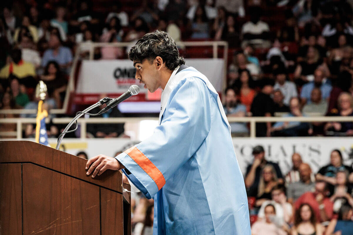 Valedictorian Aaryan Gupta gives the valedictory address at the Ballantyne Ride High School graduation on Saturday at Bojangles Coliseum. “Life is only fun when we love those around us and we are able to give back to them,” Gupta said.