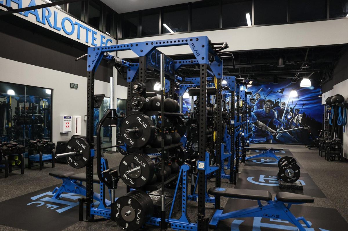 The weight room at Charlotte FC’s training facility is outfitted in PLAE brand equipment and displays a custom mural by local muralists, Matt Moore, Chris Nichol and Elliana Esquivelon Tuesday, October 10, 2023 in Charlotte, NC.