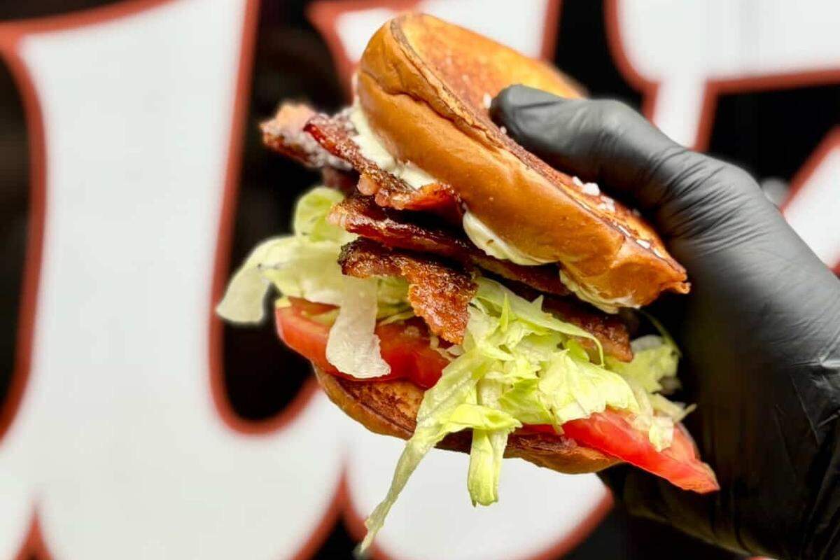 Cookin’ & Cruzin’s CBLT includes candied bacon and heirloom tomatoes sprinkled with flaky sea salt.