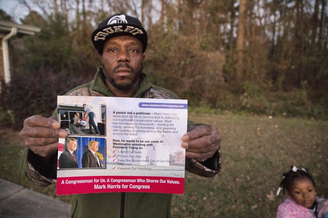 Robert Montgomery shows a campaign flyer given to him by his neighbor, who told him she was working for Mark Harris. Montgomery says he was tricked into filling out an absentee ballot for the republican candidate in the 9th congressional district of NC.