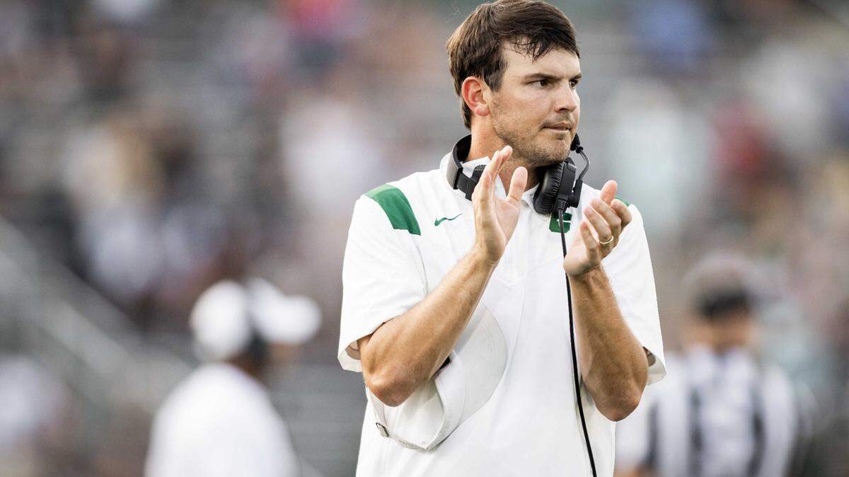 Charlotte headcoach Will Healy celebrates a 3rd down and short during late 2nd quarter action. The Charlotte 49ers Football team would host the Gardner Webb Bulldogs on Saturday September 11, 2021 at Jerry Richardson Stadium.