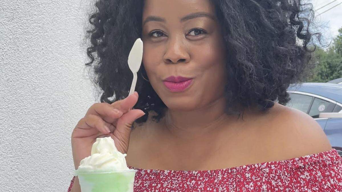 Asha Ellison dives into gelati from the new Black-owned Rita’s Five Points location on Rozzelles Ferry Road.