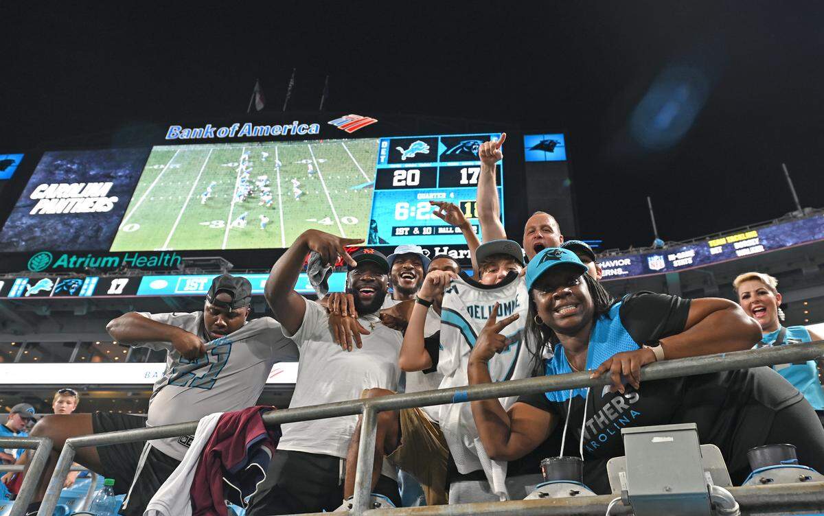 Despite the Carolina Panthers trailing the Detroit Lions during fourth quarter action, fans continue to celebrate on Friday, August 25, 2023 at Bank of America Stadium in Charlotte, NC.