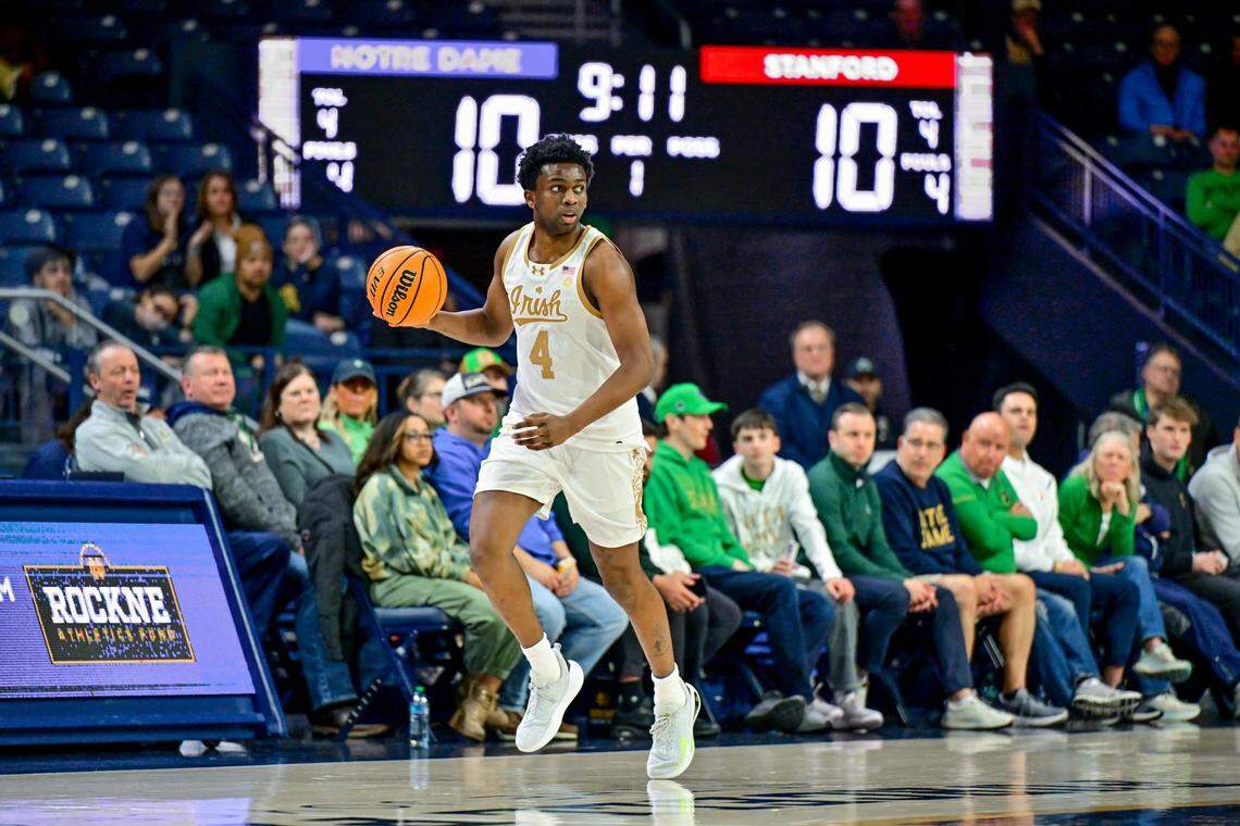 Mar 5, 2025; South Bend, Indiana, USA; Notre Dame Fighting Irish guard Sir Mohammed (4) dribbles in the first half against the Stanford Cardinal at the Purcell Pavilion.