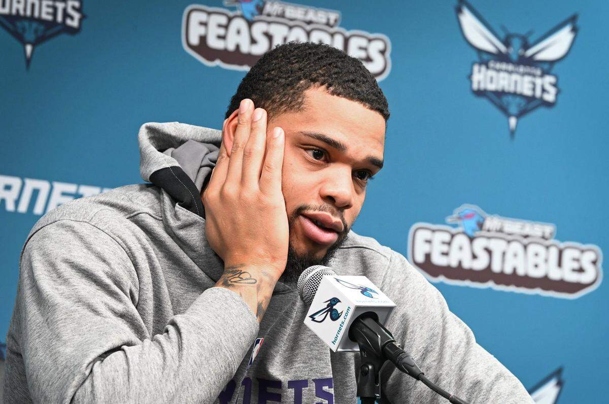 Charlotte Hornets Miles Bridges listens to a question during an interview with the local media at Spectrum Center on Monday, April 15, 2024. 