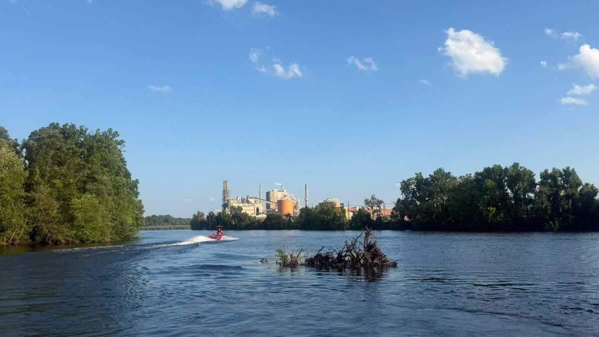 A 911 caller reported his friend had been fishing on the Roanoke River and became trapped by swift current, officials said.