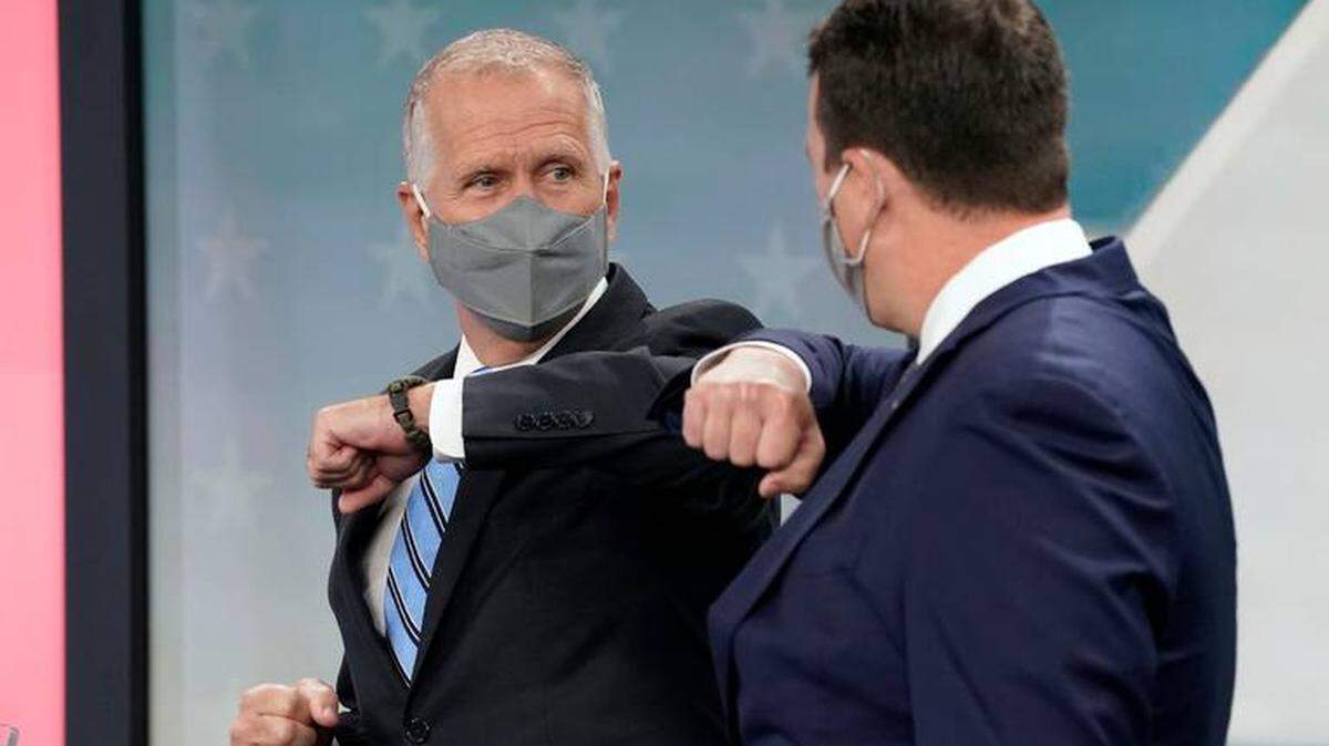 U.S. Sen. Thom Tillis, R-N.C., left, and Democratic challenger Cal Cunningham greet each other Sept. 22, 2020 prior to a debate in Raleigh. Tillis has voted to repeal the Affordable Care Act. Cunningham says he supports building upon the ACA.