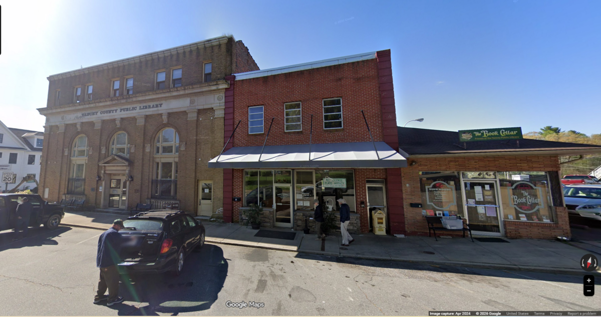 The century-old bank building sits across from the Town Square in Burnsville, NC, and the adjacent building was constructed in 1833.