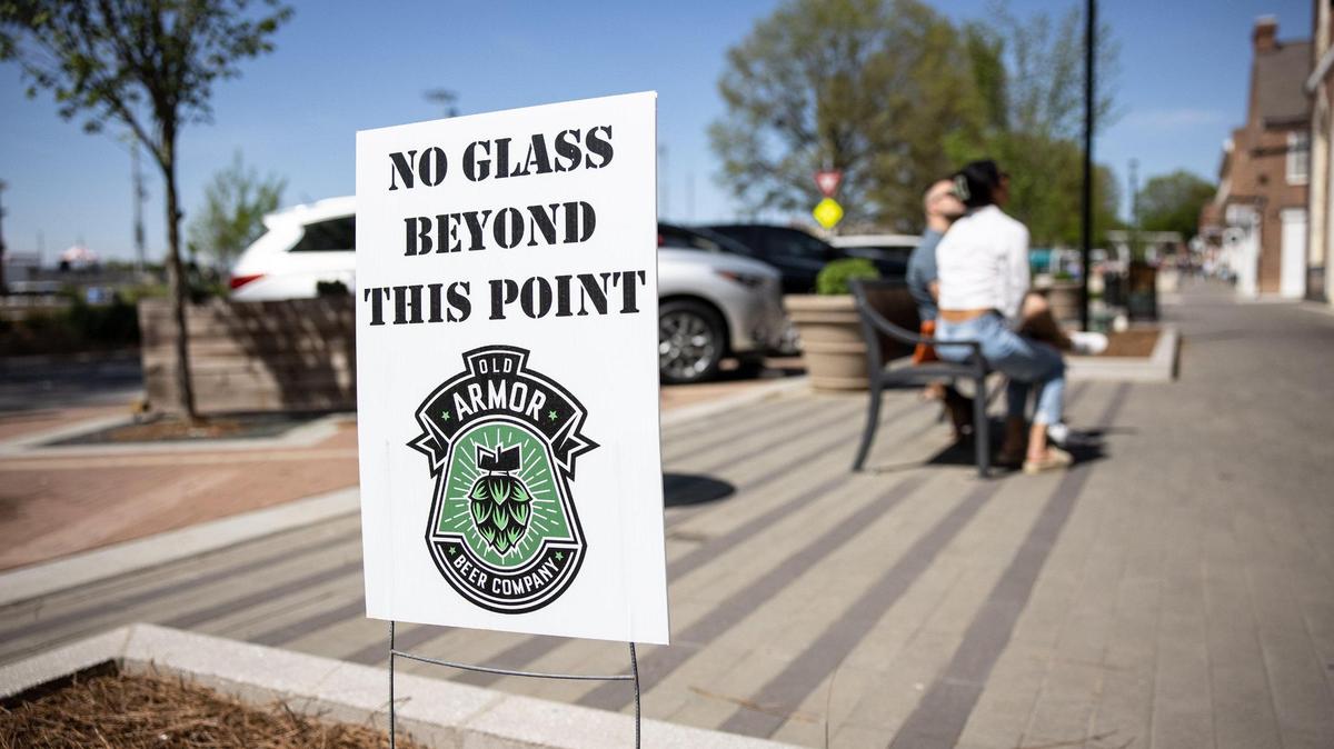 Social districts are set up with clear signs along streets and parks in defined areas, according to state law,. This sign was outside of Old Armor Brewing in Kannapolis.
