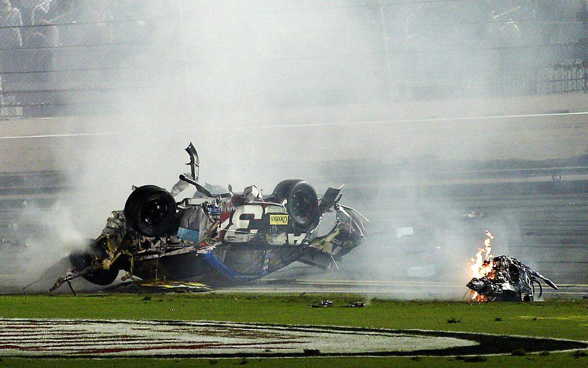 NASCAR Sprint Cup Series driver Austin Dillon car (3) comes to rest after crashing against the catch fence following the finish of the Coke Zero 400 at Daytona International Speedway.