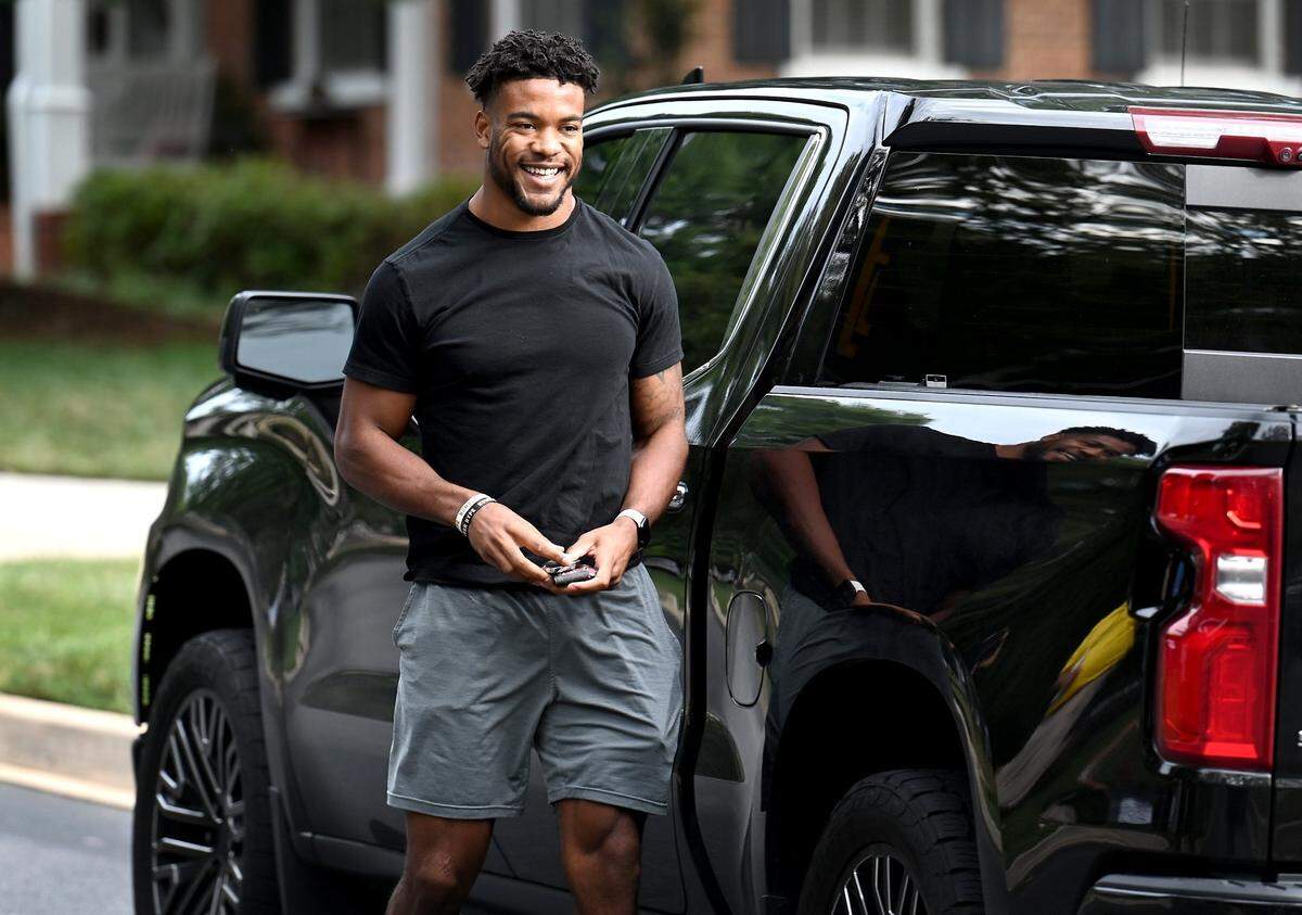 Carolina Panthers safety Jeremy China smiles as he arrives at the team’s dorm on the campus of Wofford College in Spartanburg, S.C., on Tuesday, July 26, 2022. The team’s first practice will be Wednesday, July 27, 2022.
