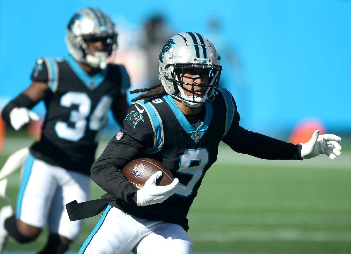 Carolina Panthers cornerback Stephon Gilmore rushes for yardage after intercepting a pass by New England Patriots quarterback Mac Jones during second quarter action at Bank of America Stadium in Charlotte, NC on Sunday, November 7, 2021.