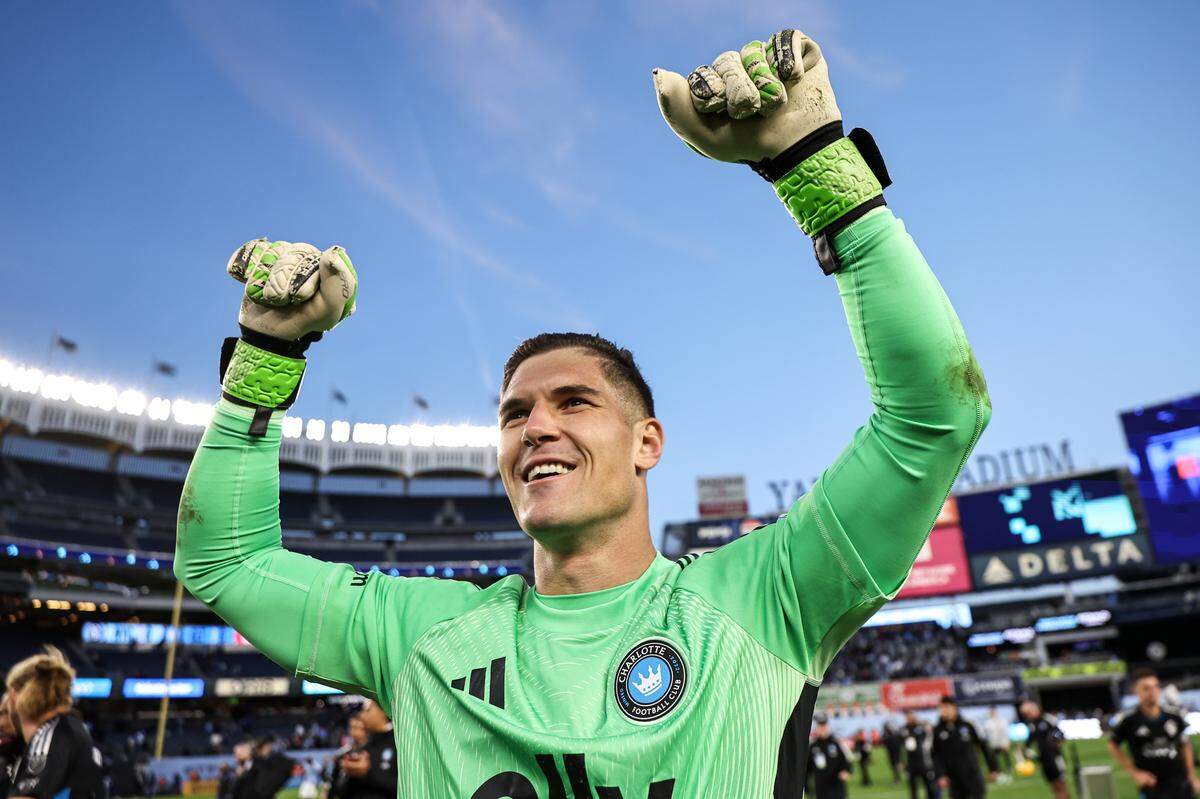 Charlotte FC’s Kristijan Kahlina celebrates after defeating New York City FC in a penalty shootout in the MLS Cup playoffs on Saturday at Yankee Stadium.