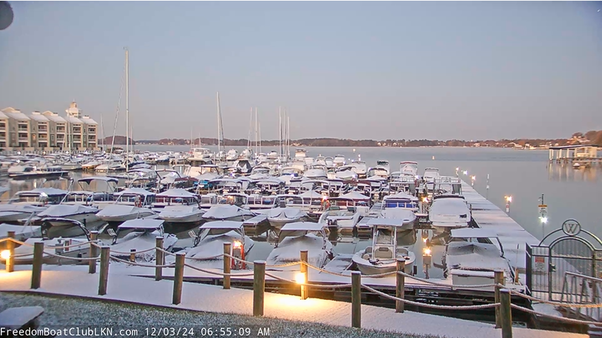 A resort camera at Freedom Boat Club – Lake Norman showed the snow began falling around 3 a.m. north of Charlotte.