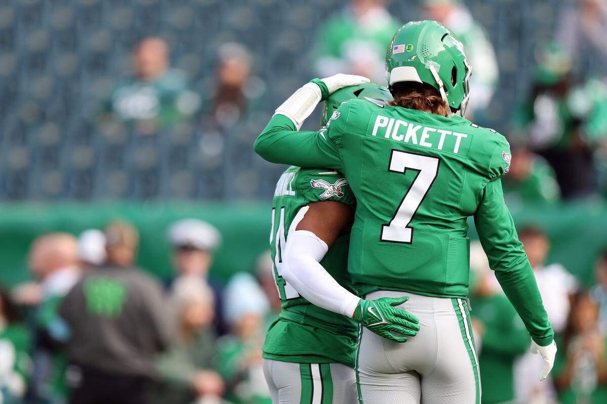 Kenny Pickett, shown here as a member of the Philadelphia Eagles, hugs Kenneth Gainwell before a 2024 game against the Dallas Cowboys at Lincoln Financial Field in Philadelphia.