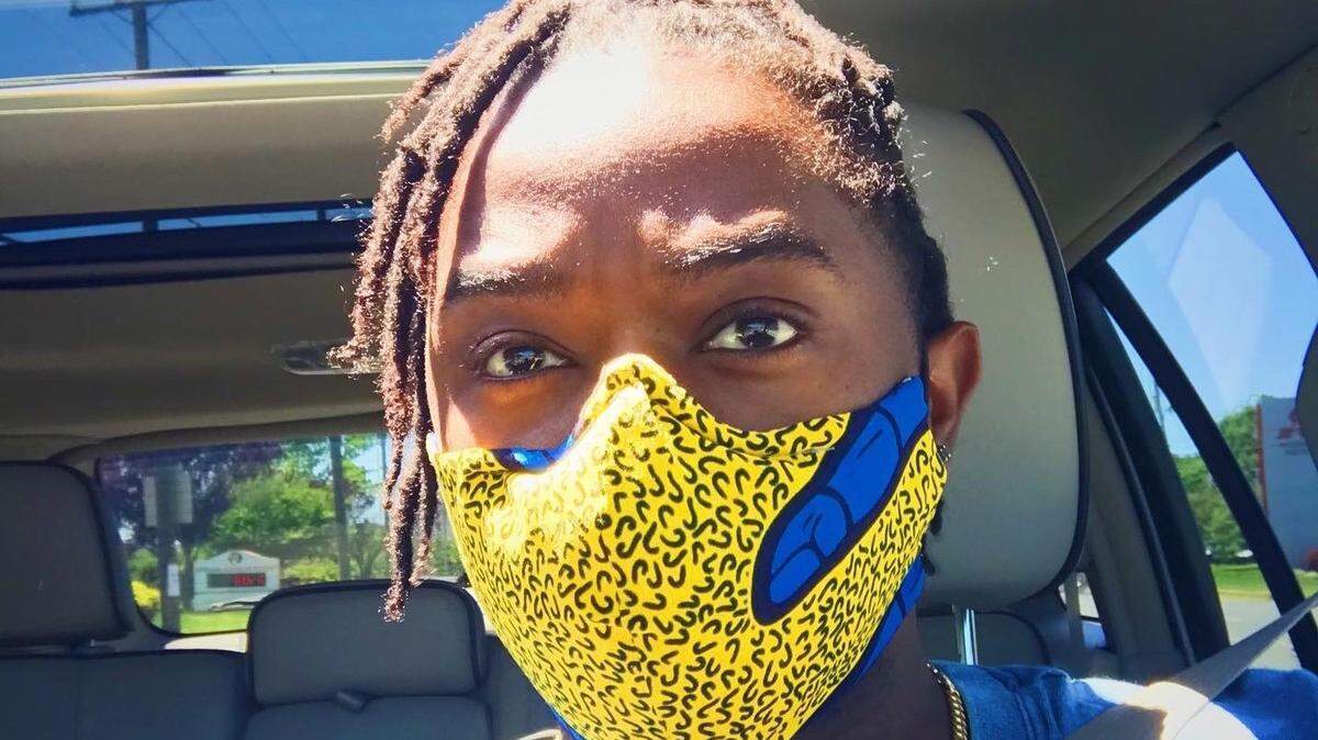 Will White made his mask himself using Ankara print with an added pocket for a filter.