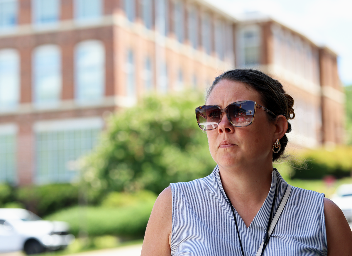 Lindsey Almond, the Economic Development Director for the City of Albemarle, stands opposite the restored Lillian Knitting Mill, located at Five Points in historic downtown Albemarle. Almond, on a recent tour of the city, said one of the ways the area is maintaining its charm is through adaptive reuse projects, like the Lillian Knitting Mill.