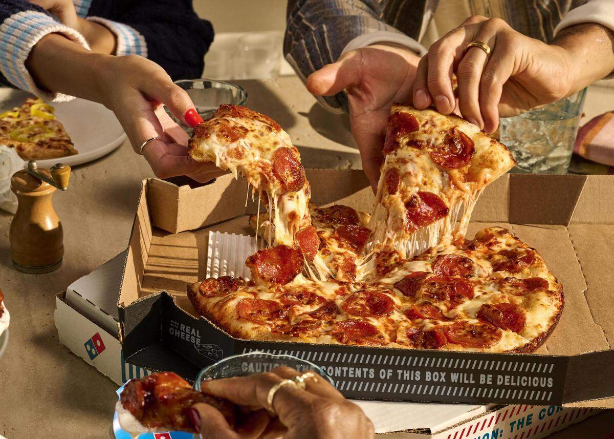 A hand-tossed pepperoni pizza from Domino’s makes for a tasty election night treat.