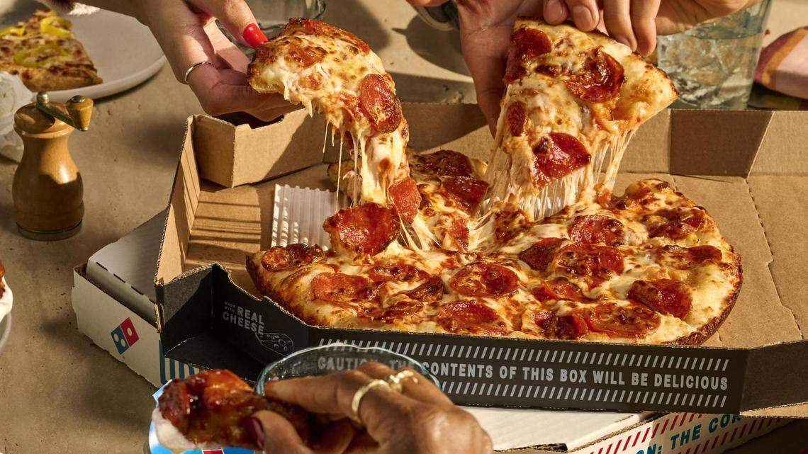 A handmade pan pizza from Domino’s.