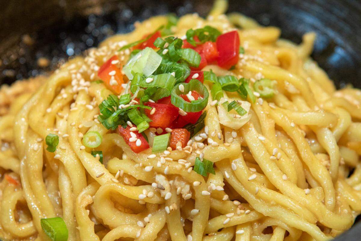 In addition to Japanese barbecue, Gyu Kaku offers kitchen-prepared menu items, including noodle dishes.