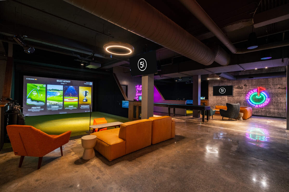 Five Iron Golf indoor golf venue typically has eight to 12 bays.