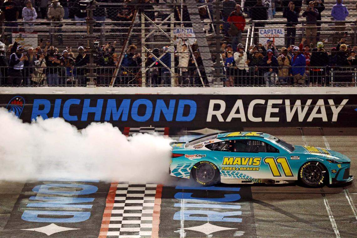 Mar 31, 2024; Richmond, Virginia, USA; NASCAR Cup Series driver Denny Hamlin (11) celebrates after winning the Toyota Owners 400 at Richmond Raceway.