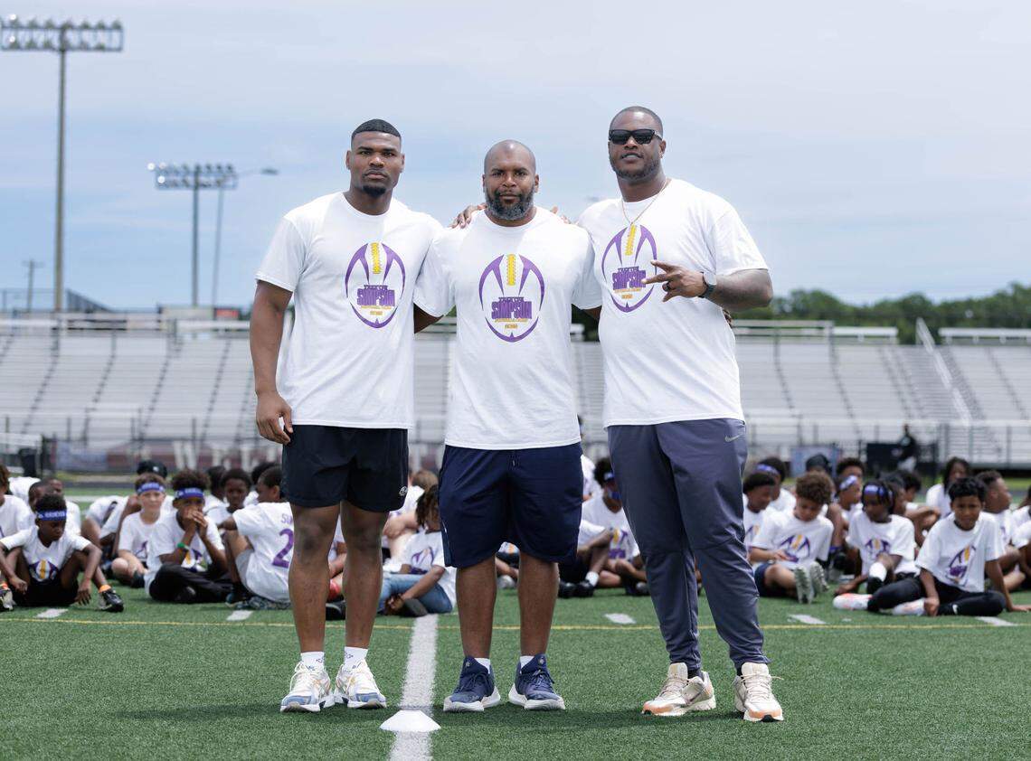 Ravens linebacker Trent Simpson, Mallard Creek High coach Kennedy Tinsley and NFL free agent DJ Humphries participated in Simpson’s free youth camp at Mallard Creek Saturday. Simpson and Humphries are alumni of the Charlotte school