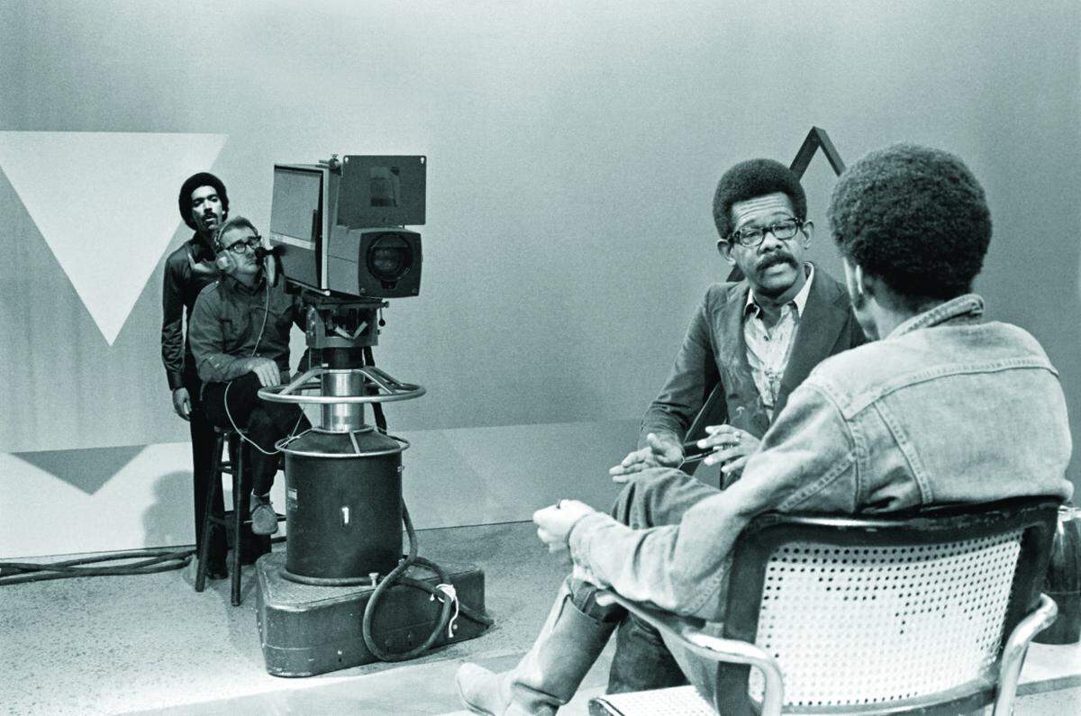 SOUL! director Stan Latham, left, stands with cameraman on set for an interview between host and producer Ellis Haizlip and filmmaker Melvin Van Peebles in a scene from the film “Mr. SOUL!”