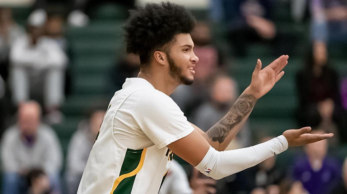 Pariot’s Raja Milton cheers on his team in Saturday’s Sweet 16 NCHSAA playoff matchup with Ardrey Kell.