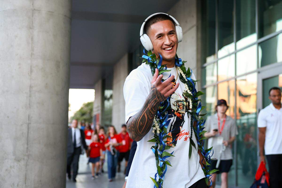 Arizona Wildcats wide receiver Tetairoa McMillan (4) walks down the Wildcat Walk before last season’s game against Texas Tech at Arizona Stadium.