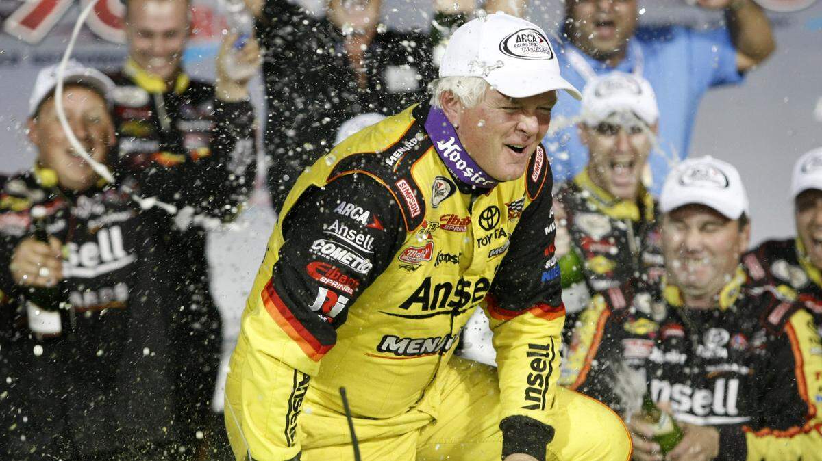 FILE- In this Oct. 4, 2013, file photo, driver Frank Kimmel is sprayed by his crew after winning an ARCA racing series auto race and the ARCA points championship at Kansas Speedway in Kansas City, Kan. Kimmel is set to become the second driver in the ARCA stock car series to make 500 career starts. (AP Photo/Colin E. Braley, File)