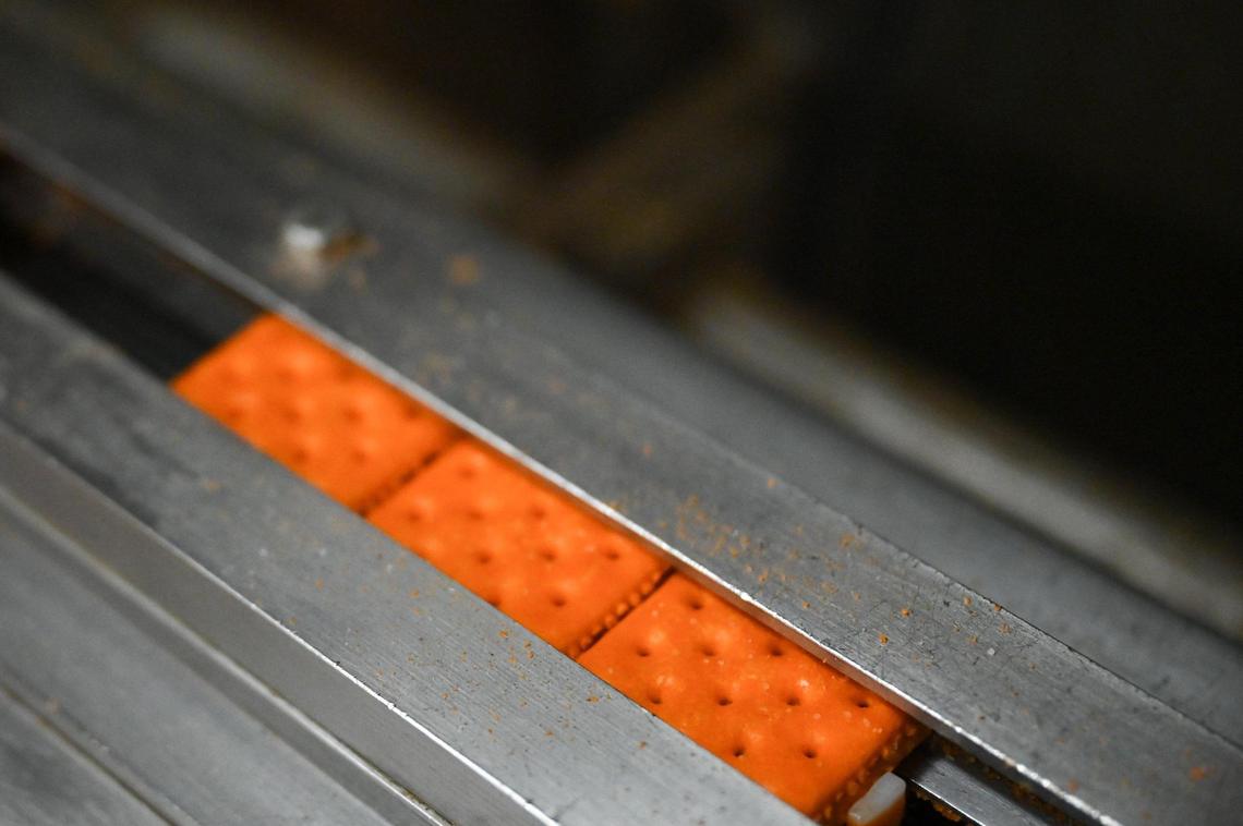Lance Toast Chee peanut butter sandwich crackers make their way down the conveyor line Nov. 8, 2023, in Charlotte. The Lance company started in 1912 in Charlotte and is now owned by Campbell’s Soup Co.