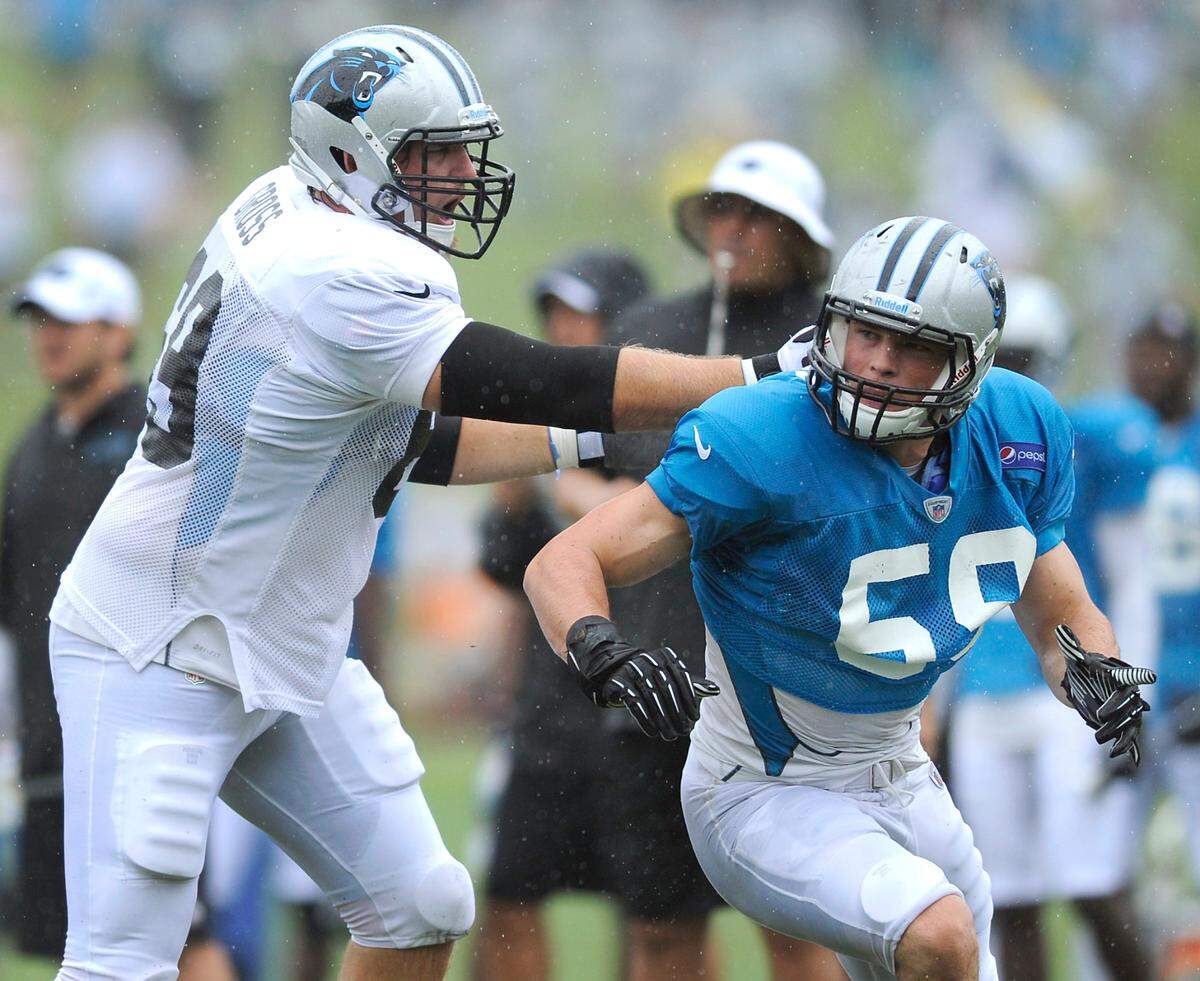 Carolina Panthers (69) tackle Jordan Gross battles (59) linebacker Luke Kuechly during practice on Tuesday, July 31, 2012 at Wofford College in Spartanburg, SC. Jeff Siner - jsiner@charlotteobserver.com