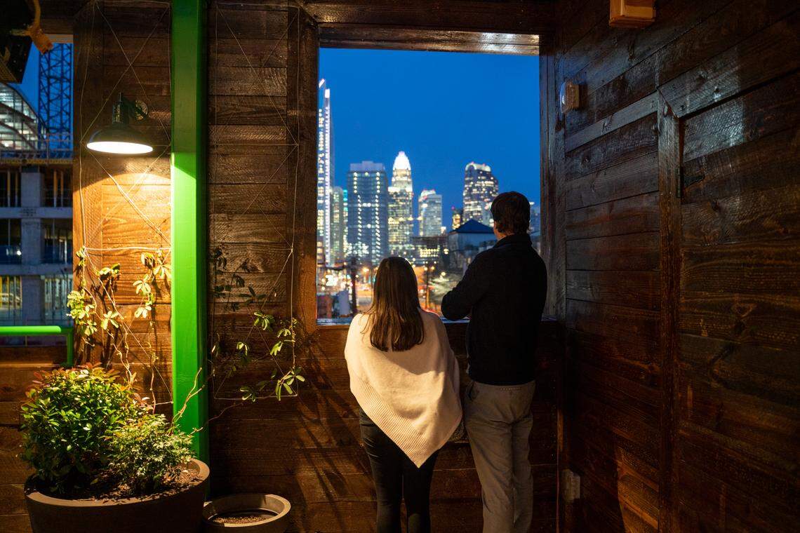 Check out the view of uptown Charlotte from the rooftop level at Charlotte Beer Garden.