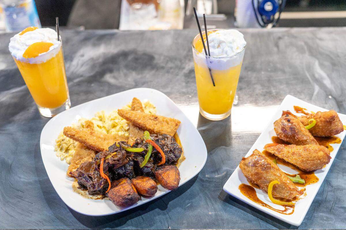 Oxtail, jerk salmon egg rolls, and peaches and cream cocktails at Forty8Hundred Caribbean Restaurant & Lounge.
