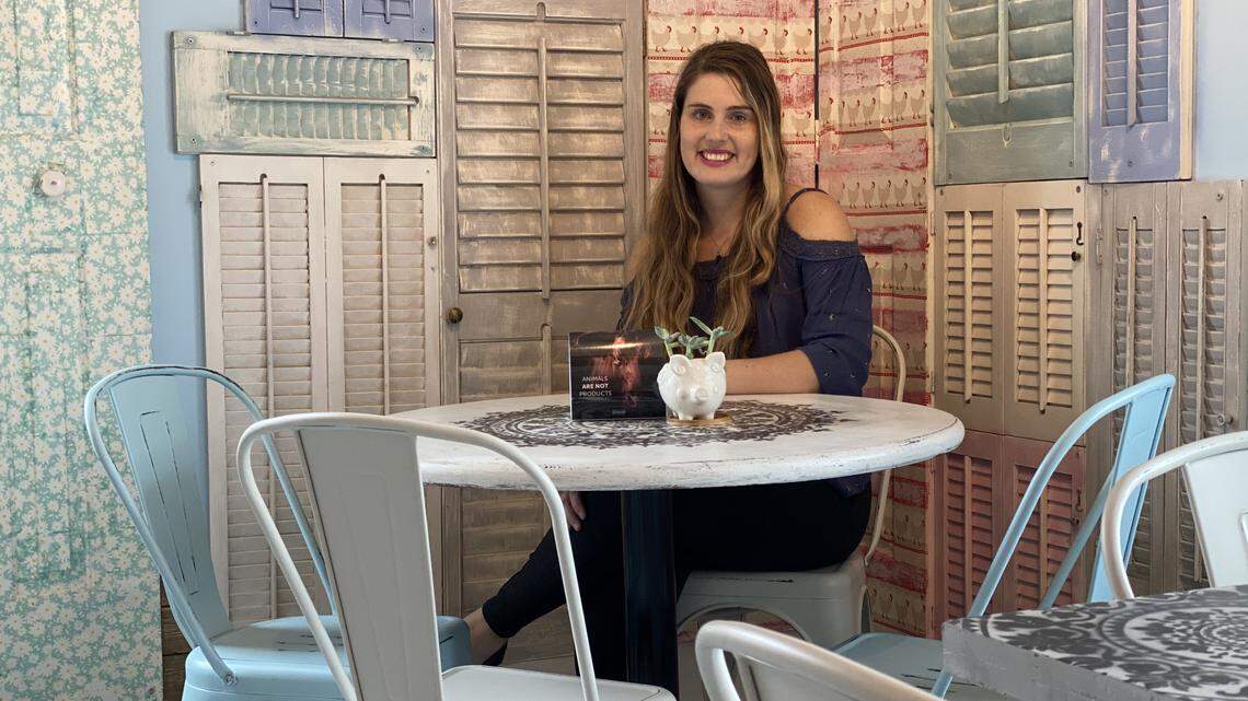 Oh My Soul vegan cafe co-owner Tallulah Duffin said the team used all repurposed materials when designing the interior of the vegan cafe. She is shown here among repurposed furniture and shutters.