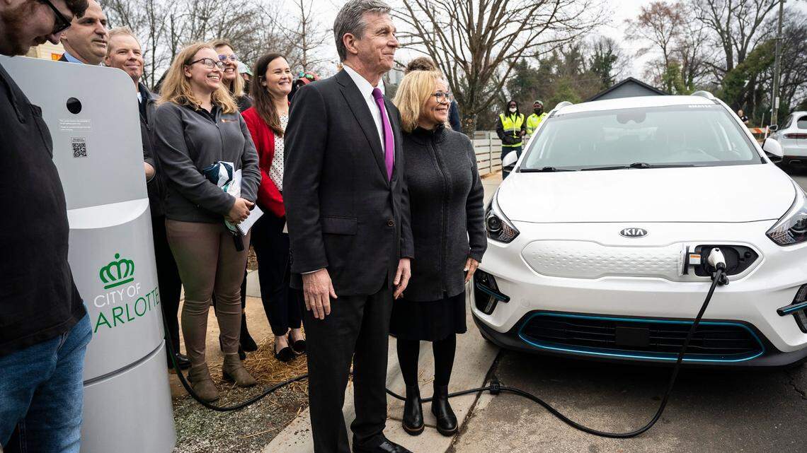 alpitronic Americas, an Italian manufacturer of high-power electric vehicle charging stations, will create 300 jobs  locate its U.S. headquarters and service center in Charlotte. Seen here in a 2022 file photo, Gov. Roy Cooper attended the unveiling of a charging station in Charlotte created by a partnership between the city, Duke Energy, Centralina Regional Council and UNC Charlotte. 


