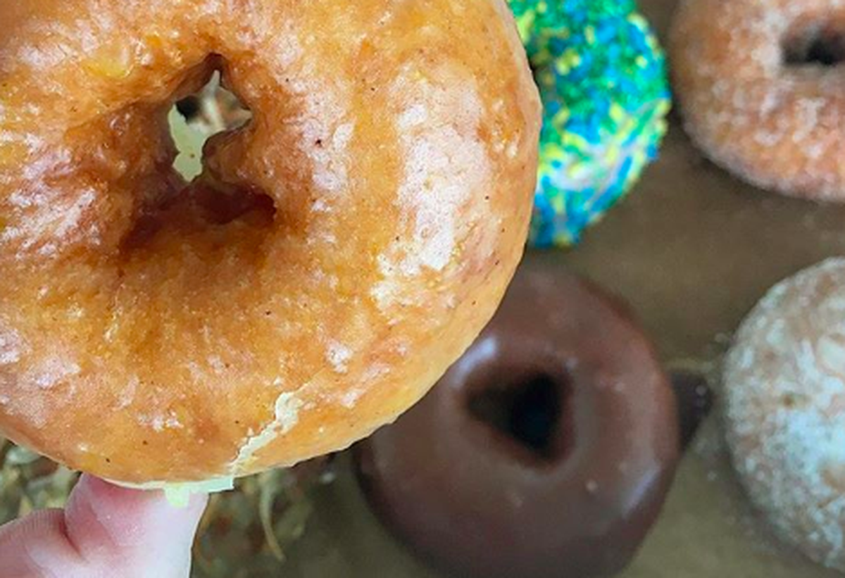 An assortment of doughnuts from Reigning Doughnuts, including the first fall flavor, Orange Clove, which was available until Sept. 23.