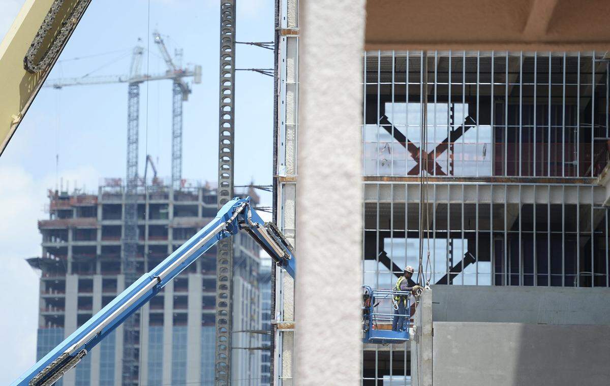 A looming trade war where tariffs on products like steel and soybeans worries some North Carolina influencers. Just south of uptown Charlotte construction continued at The Railyard Southend on Tuesday, July 10, 2018.