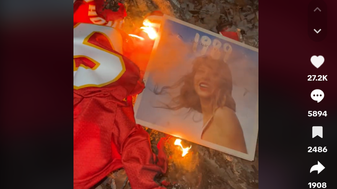 A screenshot from a TikTok star’s video burning a Kansas City Chiefs jersey and a Taylor Swift album cover.