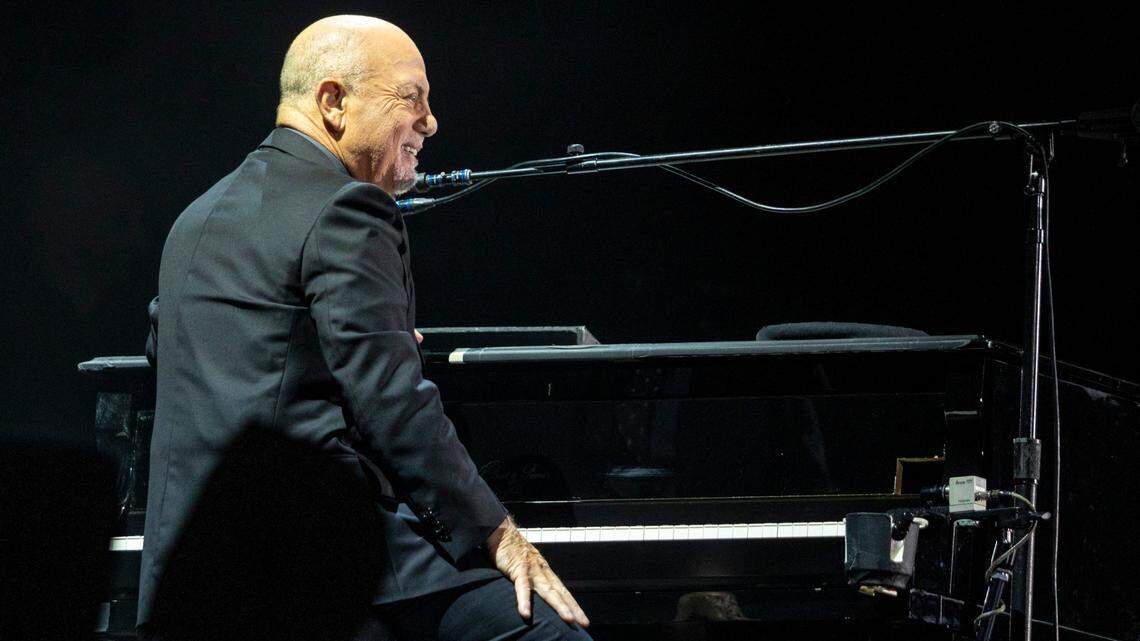 Billy Joel smiles at the crowd after interacting with some fans between songs at the Bank of America Stadium in Charlotte, NC on Saturday, April 23, 2022.