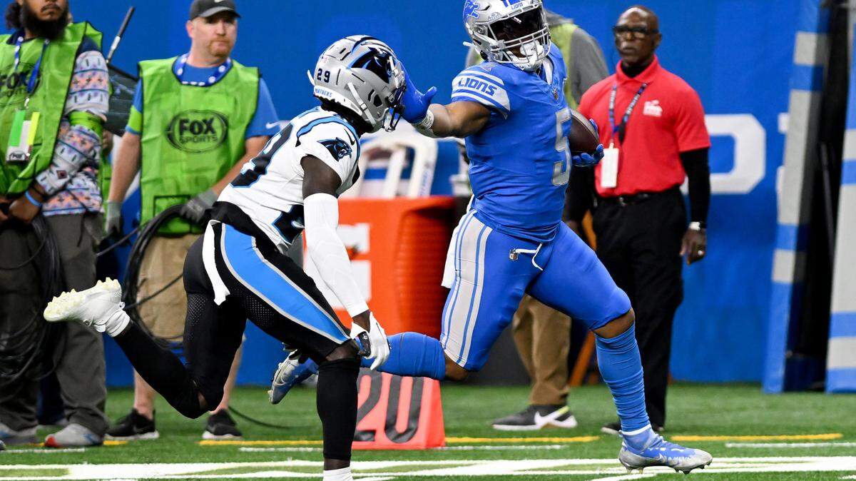 Oct 8, 2023; Detroit, Michigan, USA; Detroit Lions running back David Montgomery (5) runs for a touchdown against the Carolina Panthers in the first quarter at Ford Field. Mandatory Credit: Lon Horwedel-USA TODAY Sports