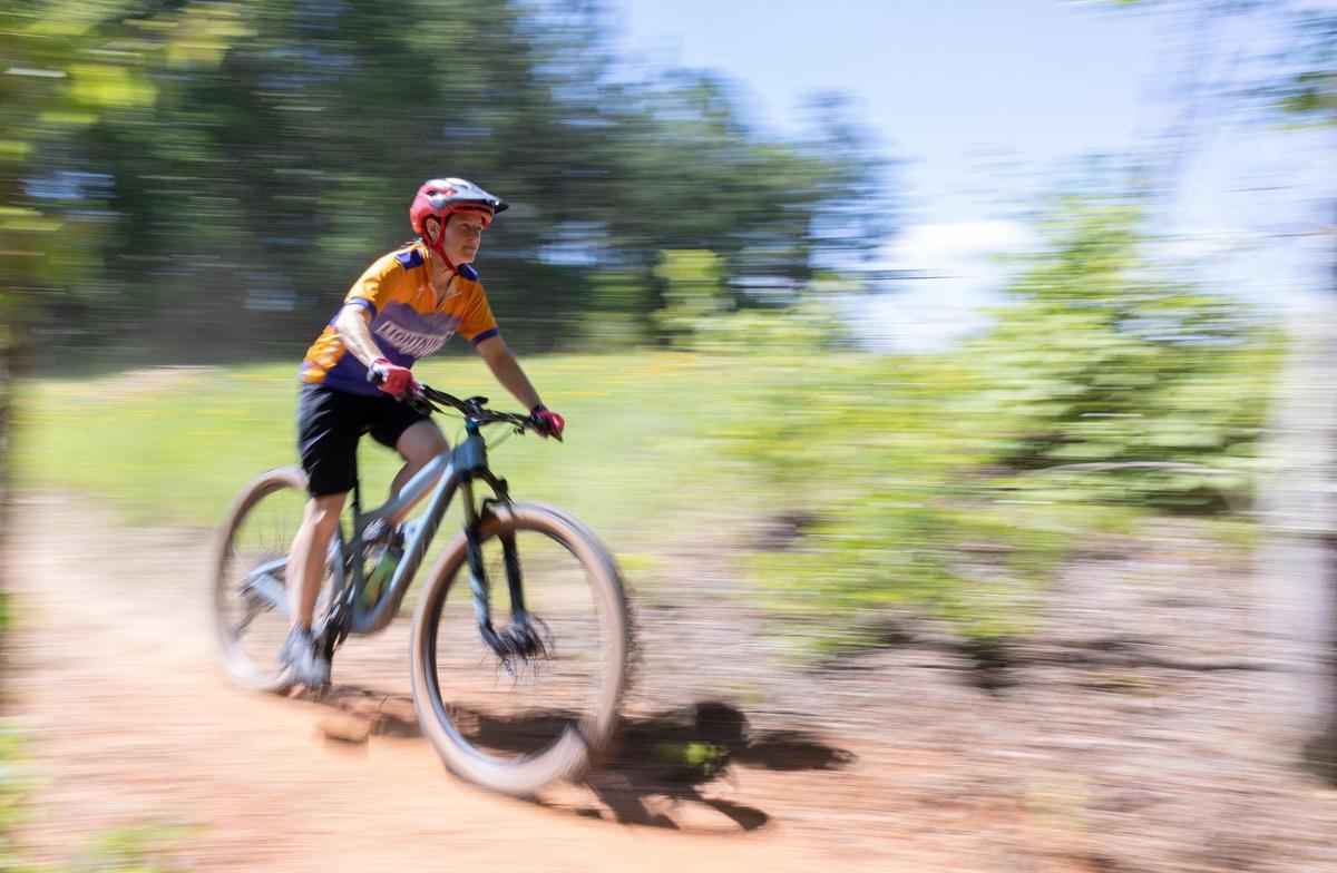 A mountain biker rides on the trail at Mountain Creek Park in Sherrills Ford.