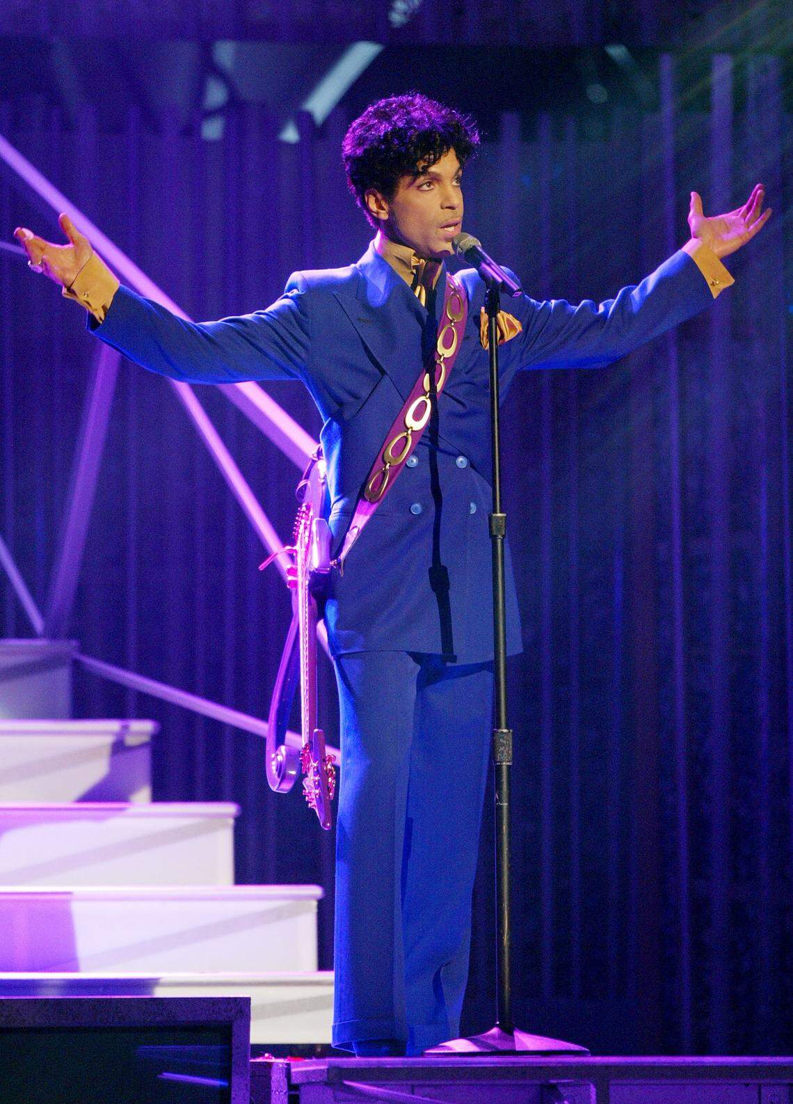 LOS ANGELES - FEBRUARY 8:  Grammy and Oscar-winning recording artist Prince performs the song "Purple Rain" at the 46th Annual Grammy Awards held at the Staples Center on February 8, 2004 in Los Angeles, California.  (Photo by Frank Micelotta/Getty Images)